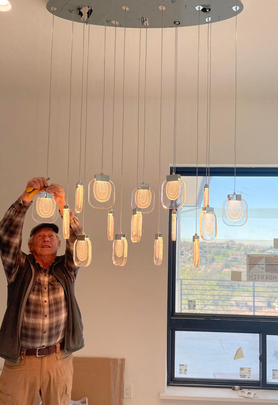 Chris finishing chandelier installation